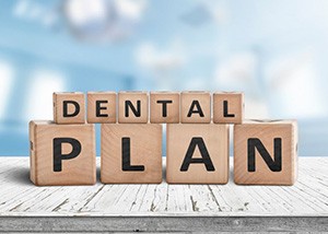 Blocks spell “dental plan”
