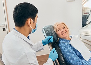 Dentist and patient talking during consultation