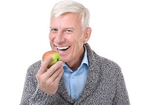 Health benefits of dental implants include the restored ability to enjoy a healthy diet