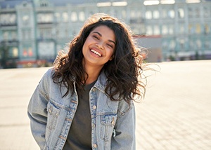 Lady smiles outdoors