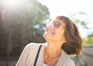 Lady smiles outdoors