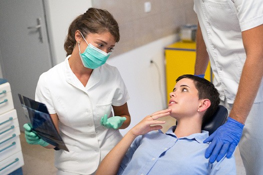 Patient in Bellville talking to dentist