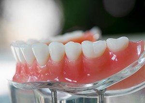 Patient smiling at dentist sitting in treatment chair