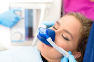 Patient undergoing sedation at dentist.