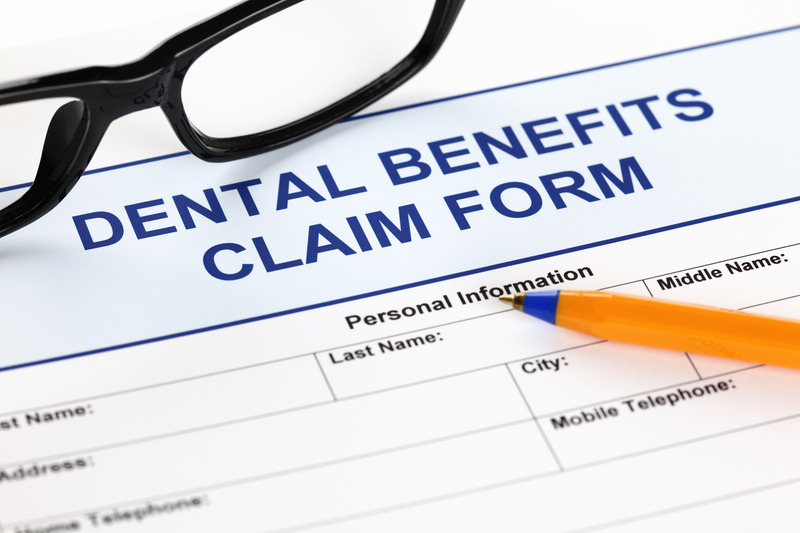 Dental insurance form on table